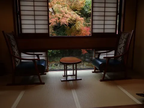 A ryokan room with a garden view